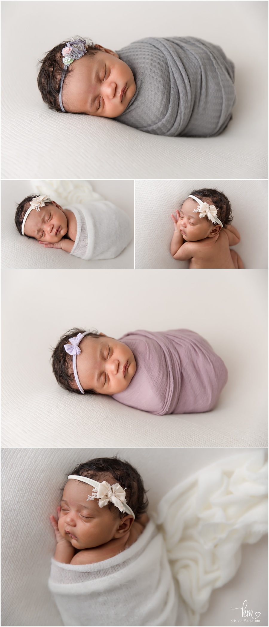 wrapped newborn baby girl on white backdrop