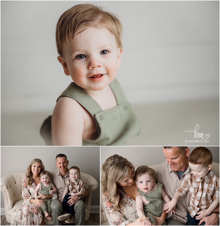 1 year old portraits in green outfit