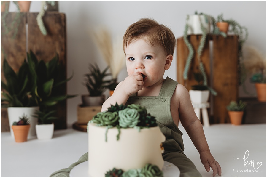 birthday boy eating succulent cake
