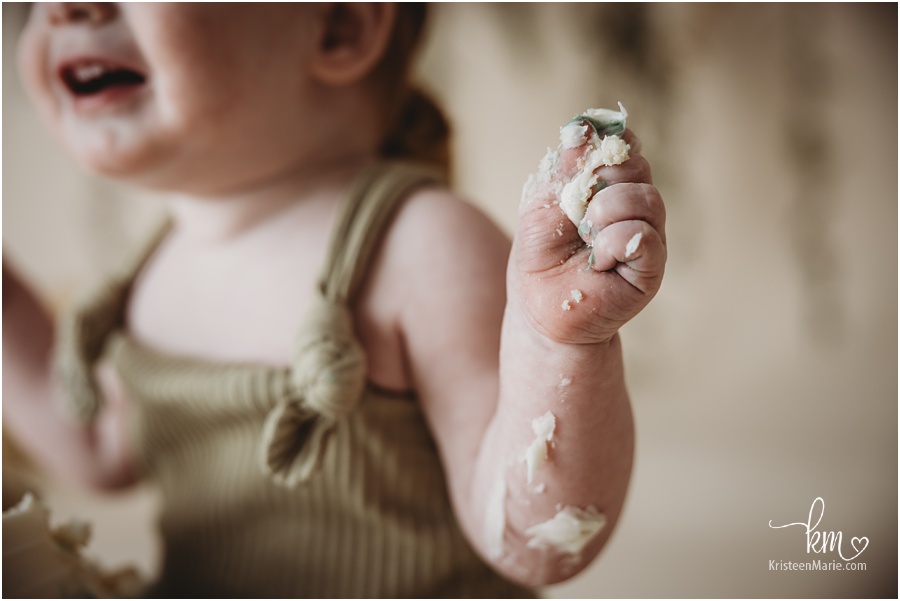 frosting on baby's hands
