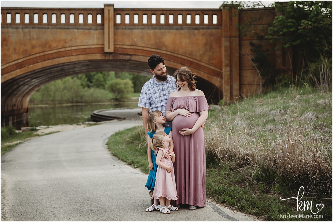 maternity pictures by the bridge