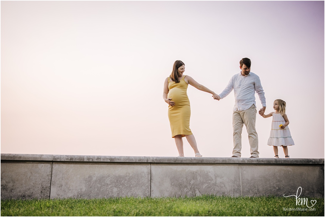 Indianapolis maternity photography at sunset with family of 3.5
