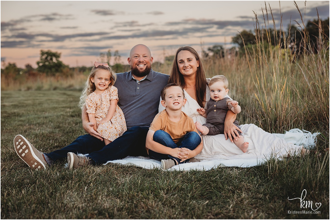 The whole family at sunset with golden skies - Indianapolis family photographer