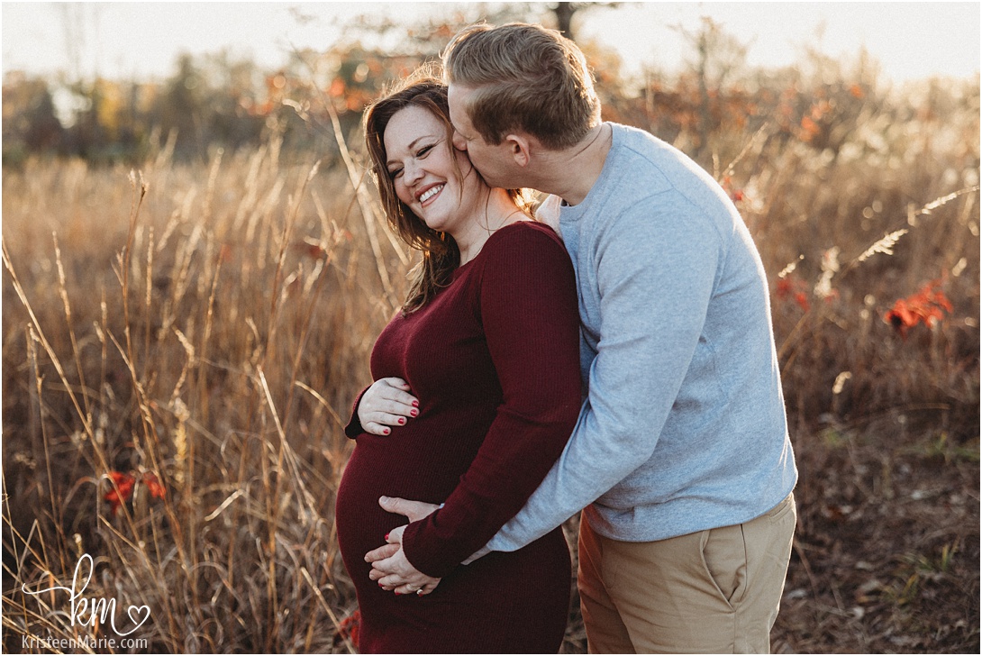 expecting couple kissing - Indianapolis maternity photography