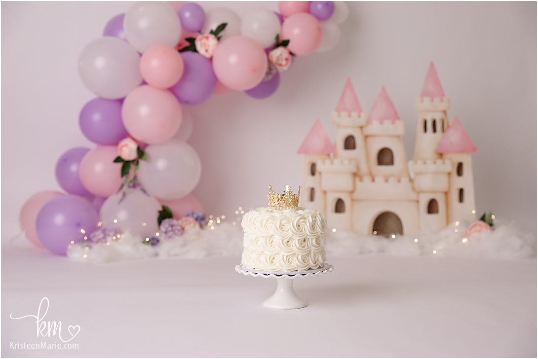Pink Princess Cake Smash - castle and floral balloon arch