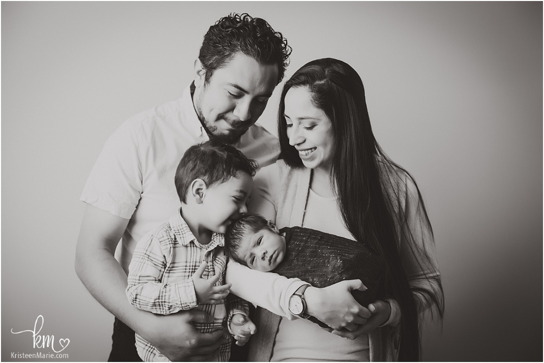 black and white Indianapolis family with newborn baby
