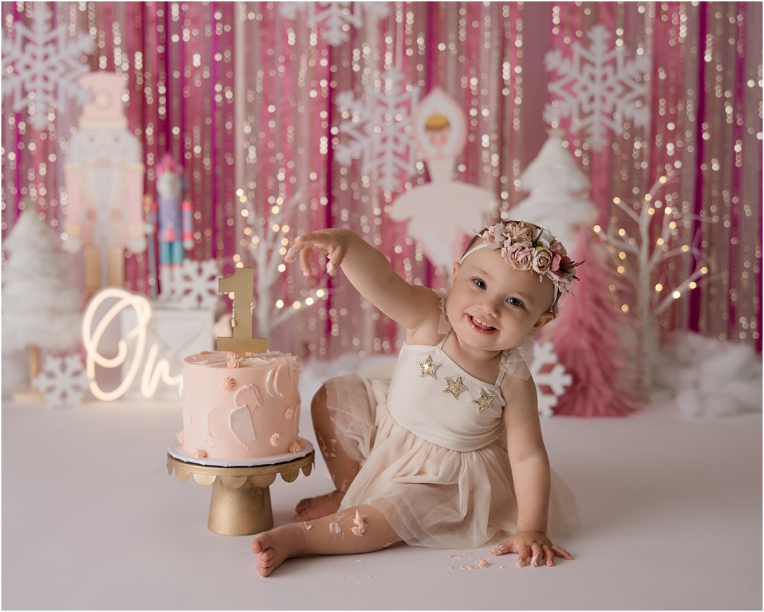 Nutcracker winter themed 1st birthday cake smash photography session