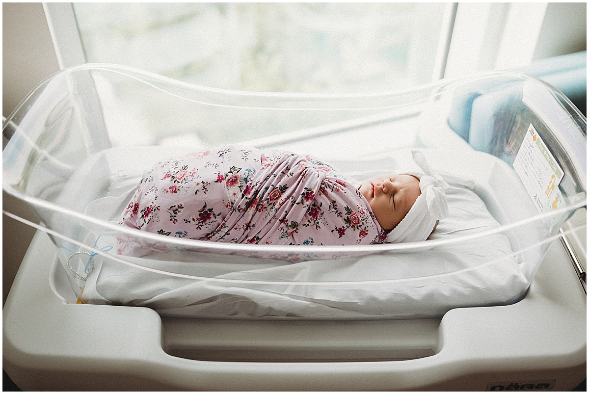 Brand new baby photographed in-hospital just hours after birth at Ascension St. Vincent Women’s and Infants Hospital.
