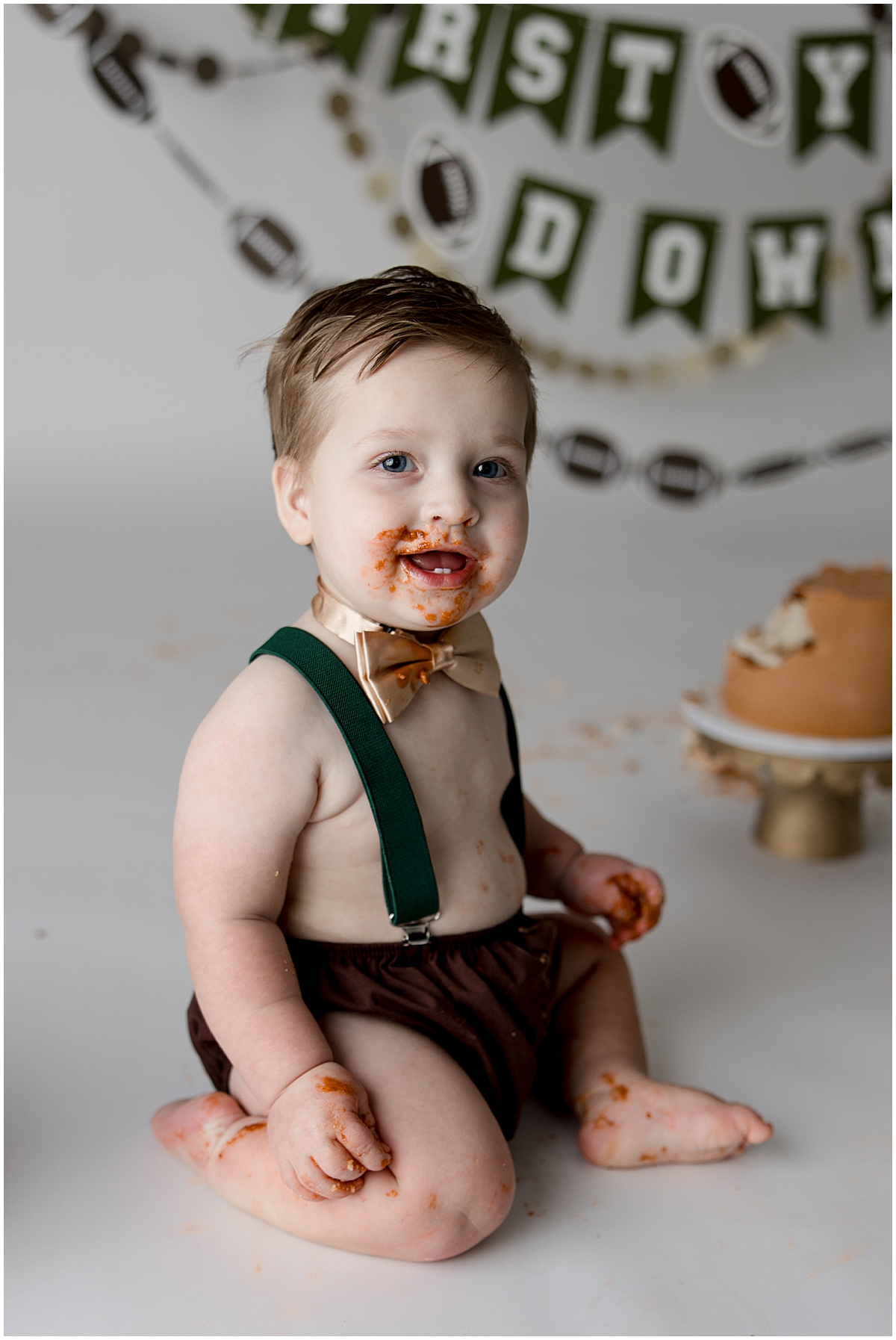 Happy boy eating cake