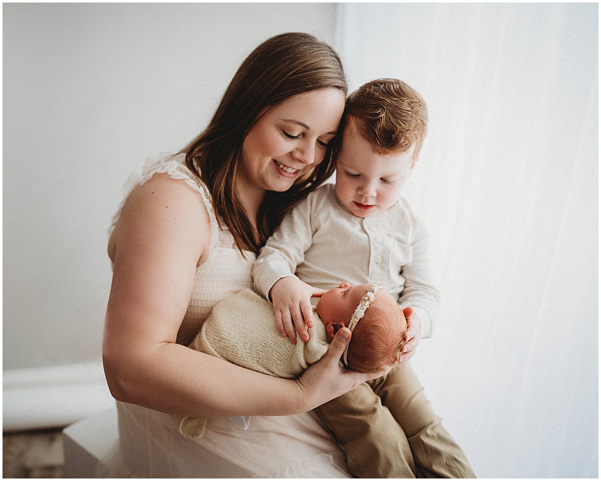 Mom and her two kids including a newborn baby - Indianapolis newborn photography