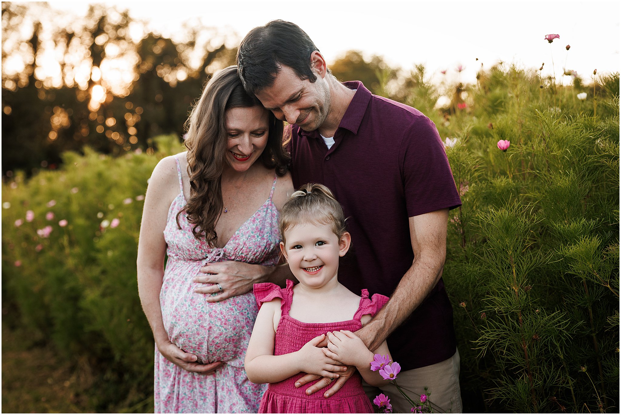 Beautiful maternity photography in Indianapolis featuring glowing parents in the wildflower fields at Dull’s Tree Farm.
