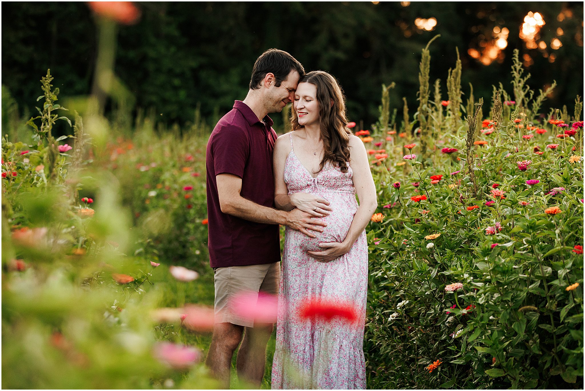 husband and wife expecting - adorable baby bump in wildflower field - Indianapolis maternity photography