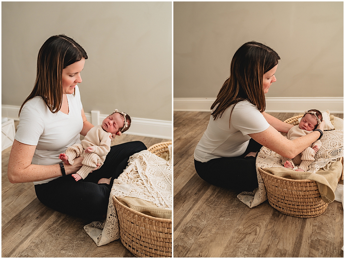 newborn baby being placed in basket by photographer 