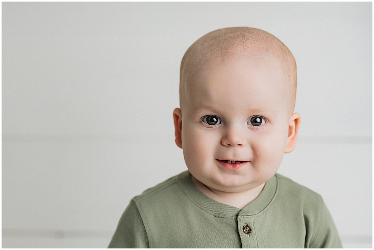 Baby boy milestone portrait in green outfit - Indianapolis baby photographer